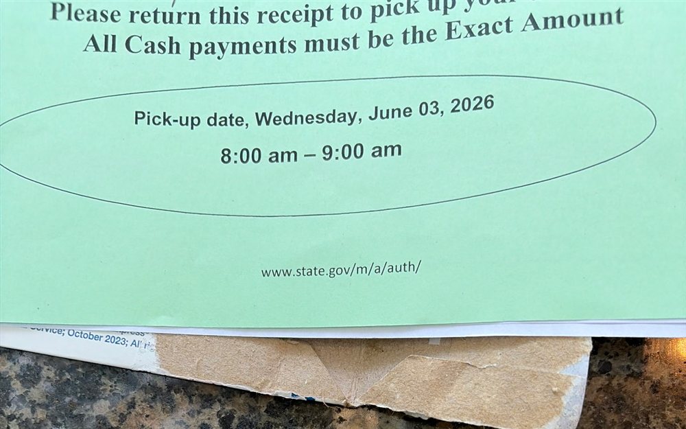 U.S. Department of State pickup receipt showing the pickup date
